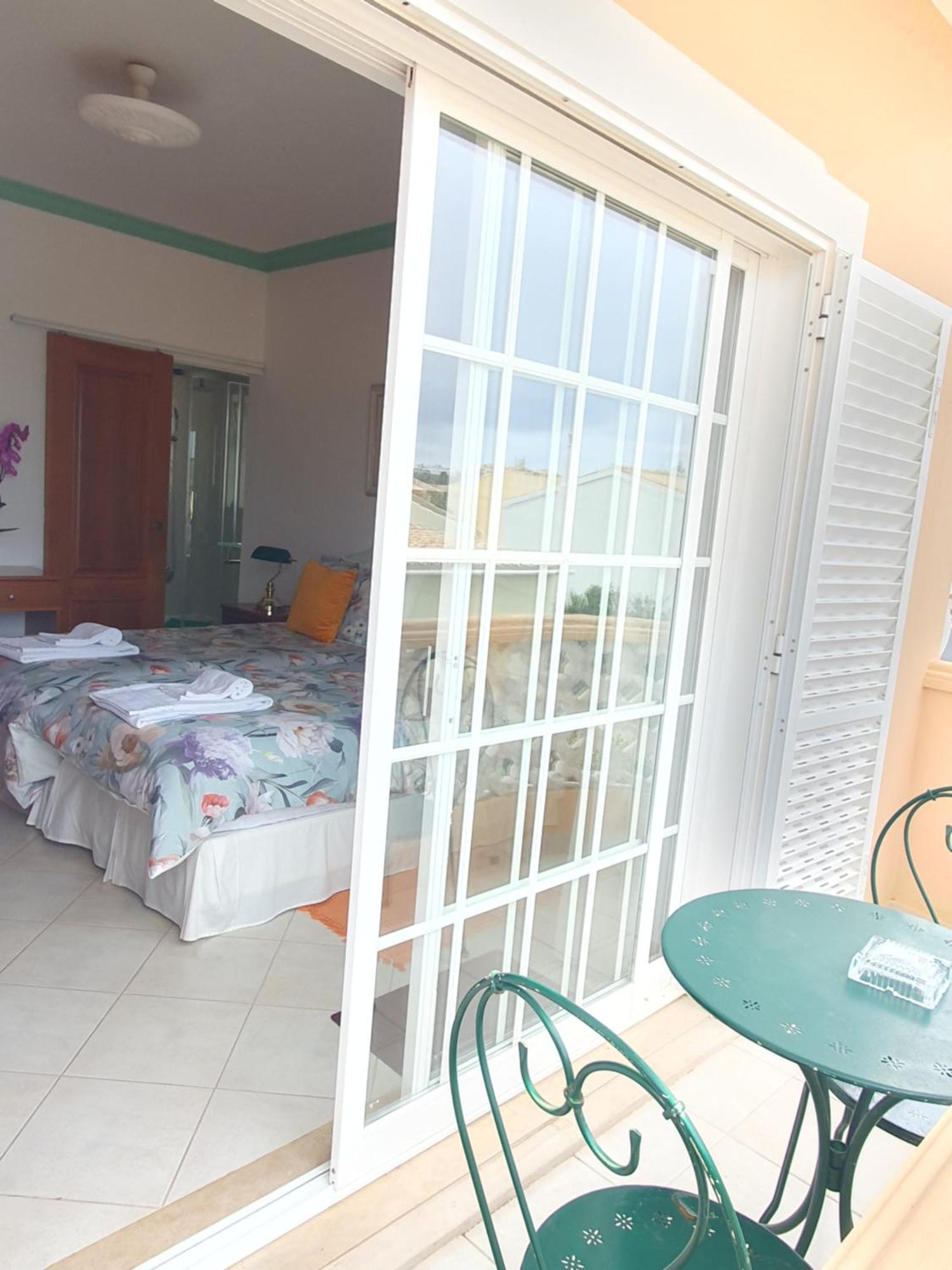 Vila Apartamentos Estrela Lagos Kamer foto